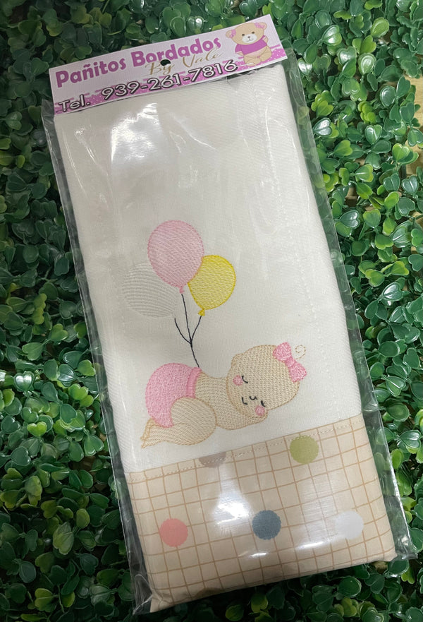 Bebé con globos